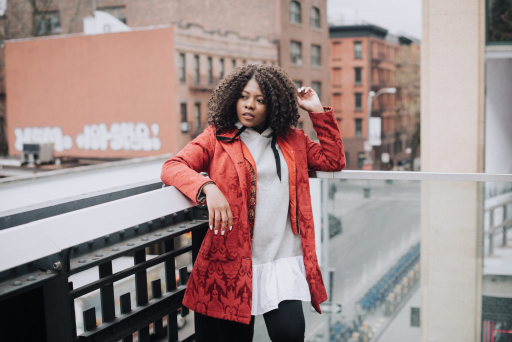 Styling a red brocade coat and chic hoodie 