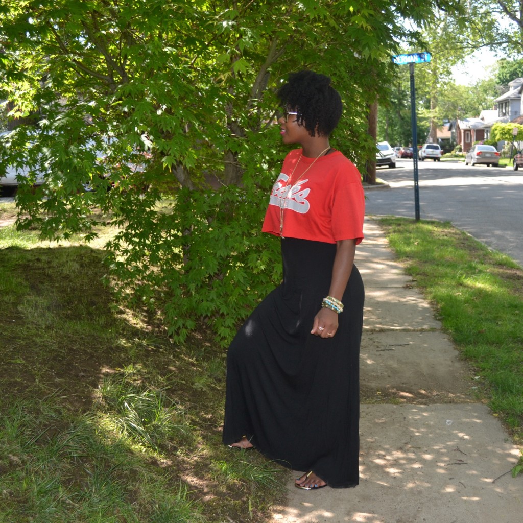 Looking Fly on a Dime: black maxi dress with a red crop top